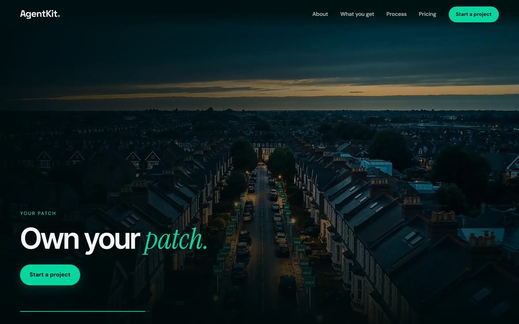 The last scene of the AgentKit homepage film: a town at dusk with SOLD boards down the street, under the line Own your patch.