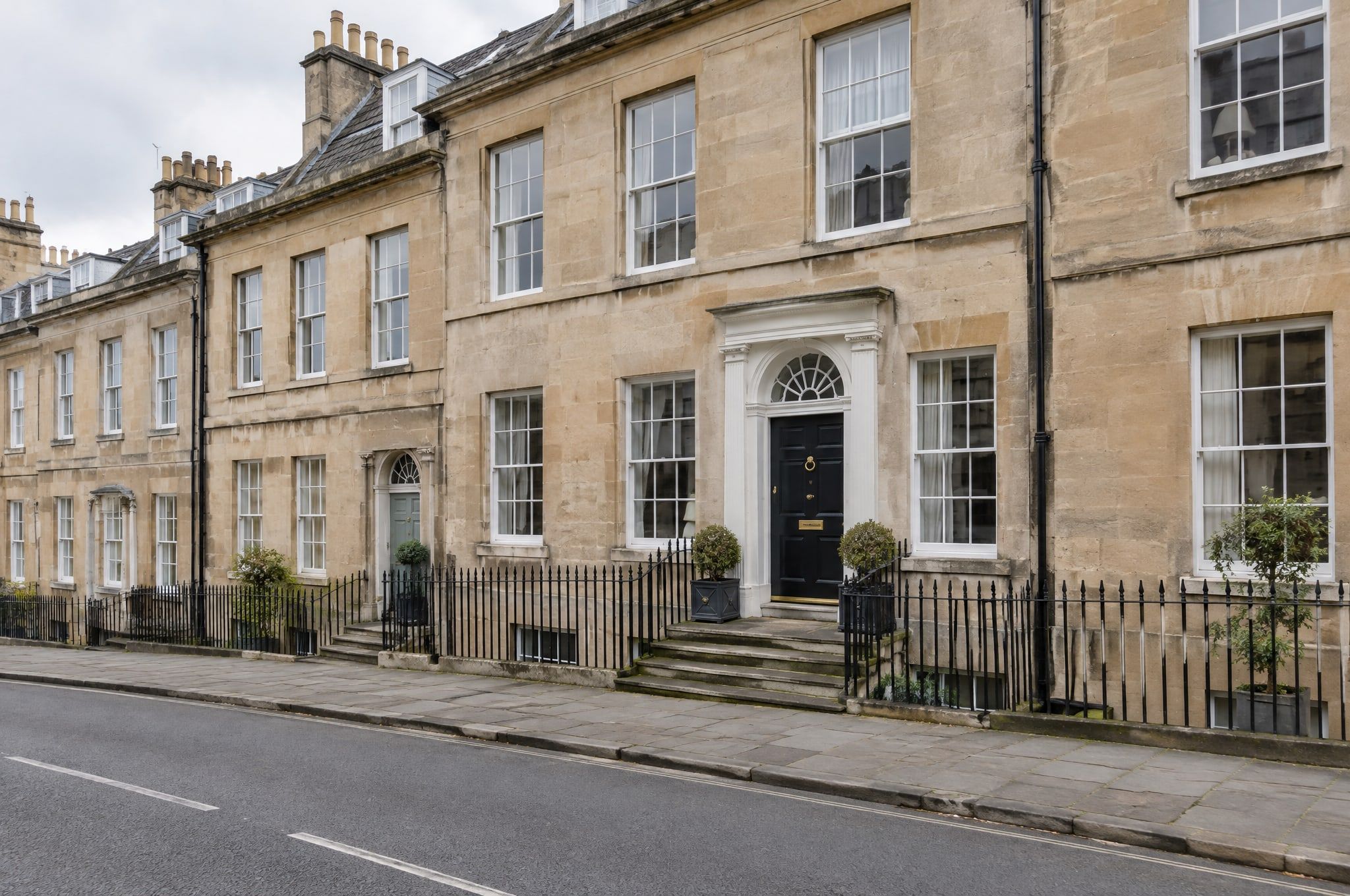 Church Street, Ashbourne: a Georgian stone town house with a black front door and railings, sold by Fearn Hollis