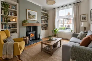A listing photograph of a living room with a woodburner, sent for checking